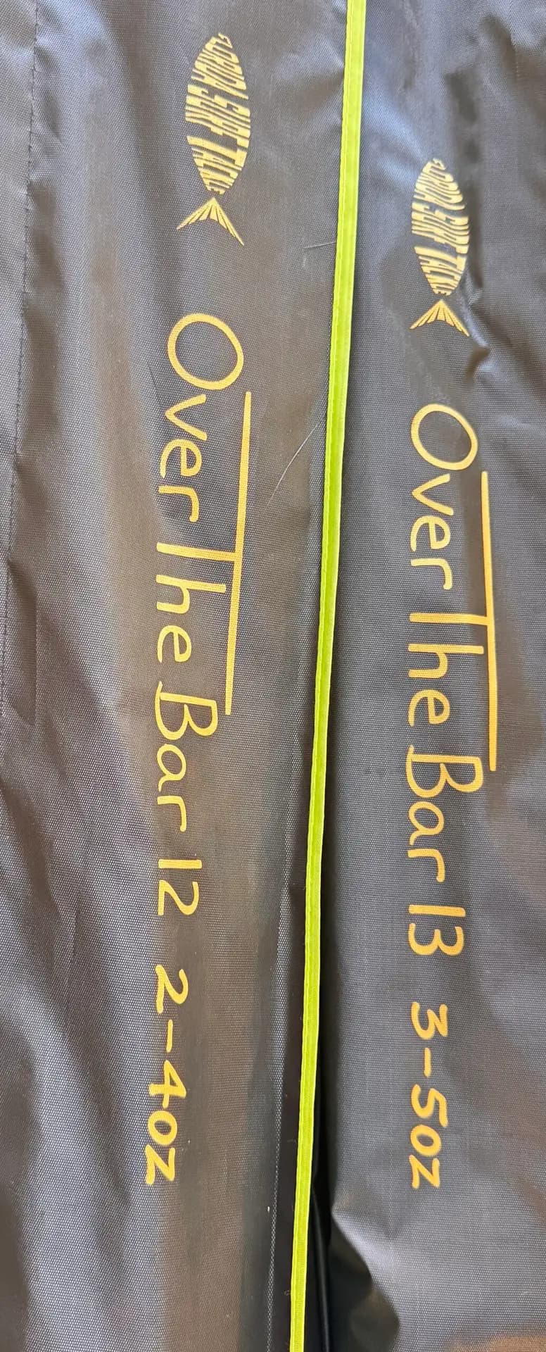Over the Bar 13' Blue fishing rod with green wraps and grips 2